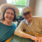 residents smiling at Kentucky derby party