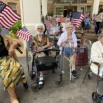 group of assisted living residents at a fourth of July event
