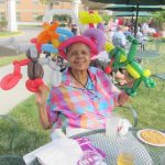 resident with balloon animals