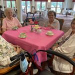 resident celebrating mothers day in dining room