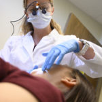 dentist examining patient