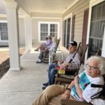 assisted living sitting outside